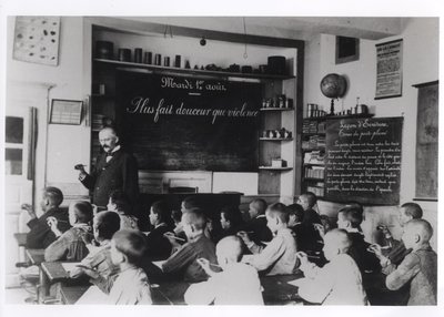 Children in a classroom by French Photographer